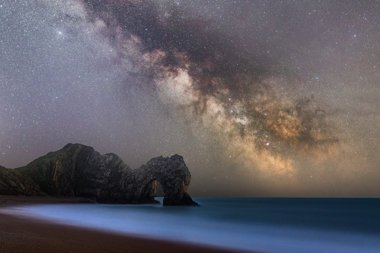 Durdle Door under the Milky Way at Durdle Door, Dorset — fine art landscape photography print by Liam Hancox
